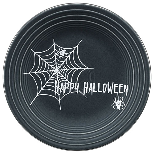 Black plate with spiderweb and the words Happy Halloween painted on its face.