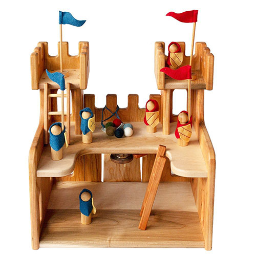 Wooden toy castle with wooden soldiers.