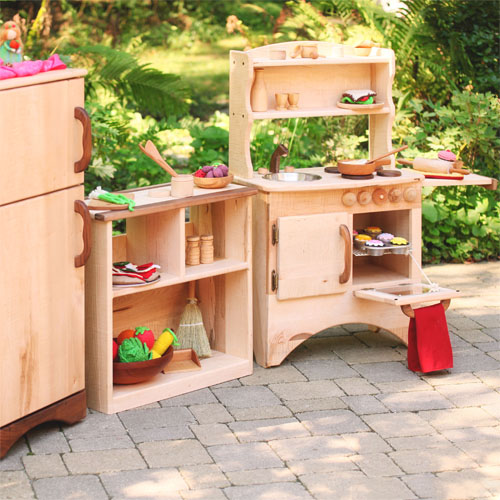 Wooden kitchen set for kids with toy accessories.