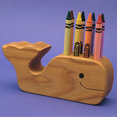 Whale shaped wooden pencil holder.