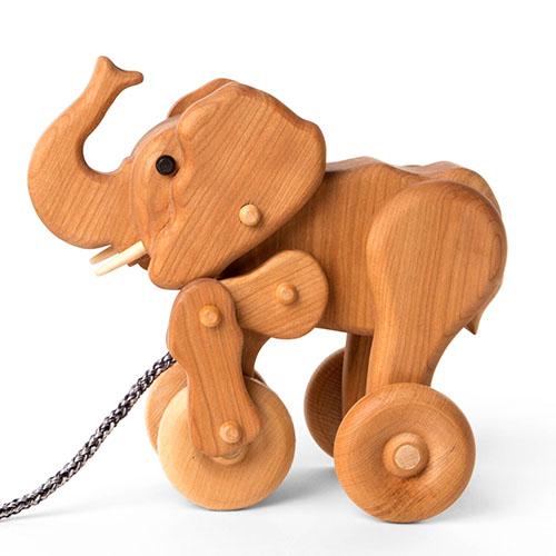 Wooden elephant pull toy.