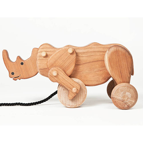 Wooden rhino pull toy.