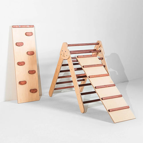 Wooden climber triangle toy with ladder and rock wall ramps.