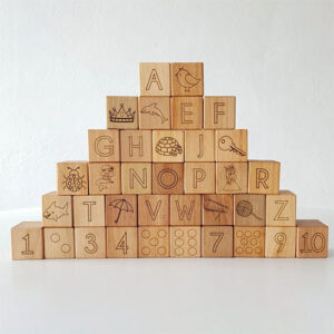Wooden alphabet blocks with letters and pictures.