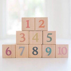 Wooden blocks with numbers in different colors.