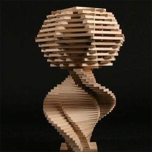 Spiraling sculpture Ship built from toy wooden planks.
