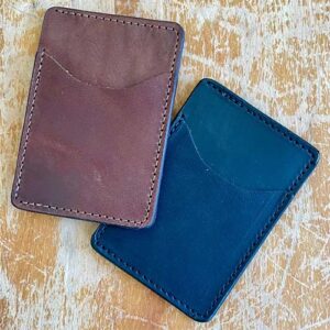 Set of brown and blue leather minimalist card wallets.