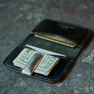 Black horween leather card wallet with silver American made money clip by Coronado.