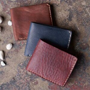 Black, brown and red horween leather bifold wallets by Coronado.