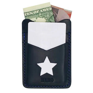 Black leather card case with star shaped cutout by Disc Studio.