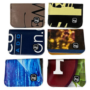 Colorful bifold wallets made in USA out of upcycled vinyl by Green Guru Gear.