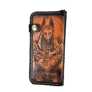Black leather clutch wallet with Egyptian god design carved into it.
