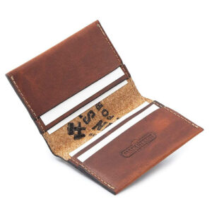 Brown leather bifold card case by Main Street Forge.