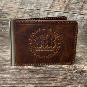 Dark brown money clip embossed with Mitchell  Leather seal.