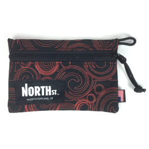 Red and black travel pouch wallet with zipper by North Street Bags.