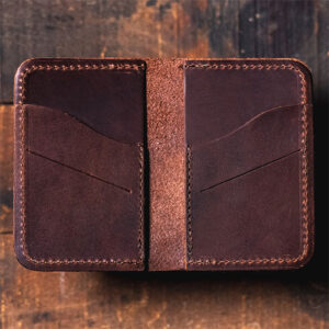 Brown-red leather bifold wallet with 4 card slots by Origin.
