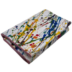 White leather trifold wallet with splashes of bright colors by Pingree Detroit.