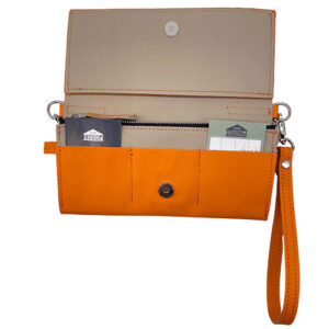 Orange leather clutch wallet with wrist band by Pingree Detroit.