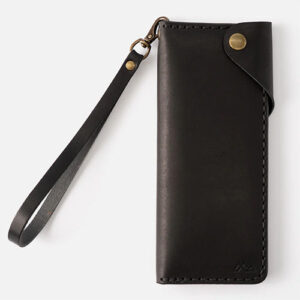 Black leather clutch wallet with strap by Range Leather.