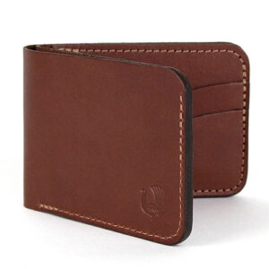 Brown leather bifold wallet by Red Clouds Collective.