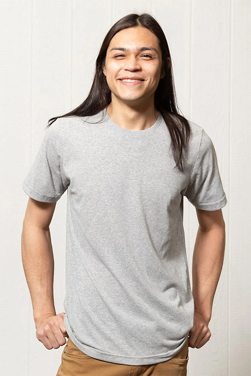 Young man wearing grey crew-neck t-shirt.