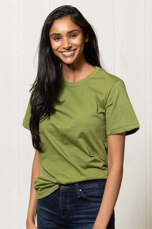 Young woman wearing green crew-neck t-shirt.
