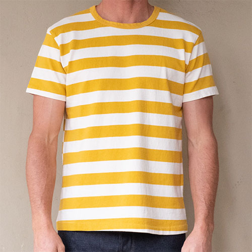 Man crew neck t-shirt with white and yellow horizontal stripes.