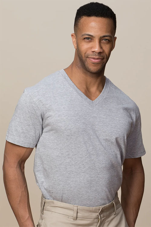Man wearing grey v-neck undershirt.