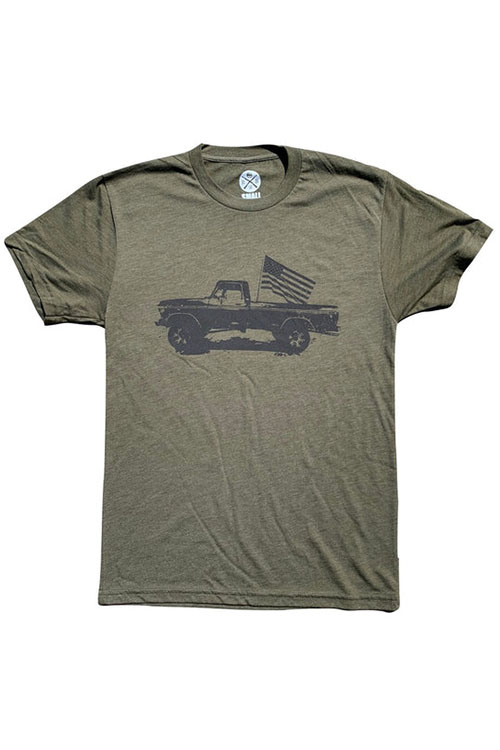 Army green crew-neck tee with print of pickup truck flying American flag on the chest.