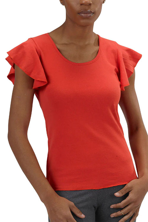 Woman wearing red crew-neck t-shirt with ruffle sleeves.