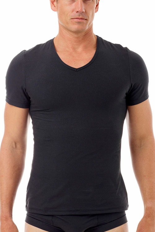 Man wearing black short-sleeve compression t-shirt.