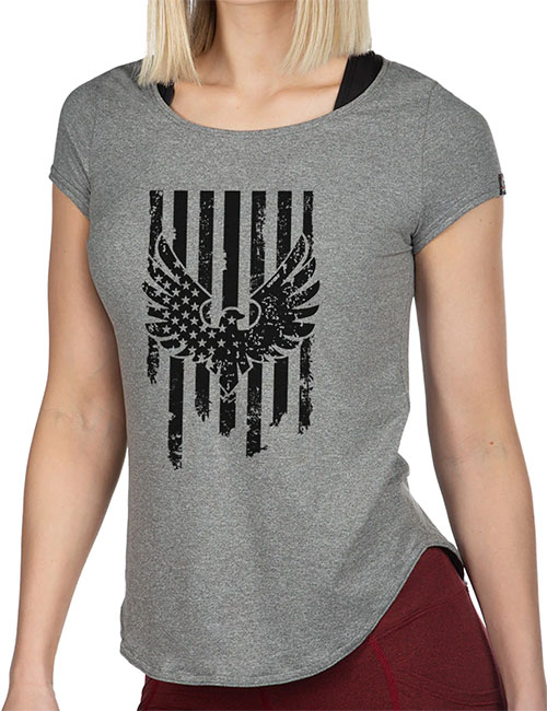 Woman wearing grey t-shirt with black American flag and eagle.