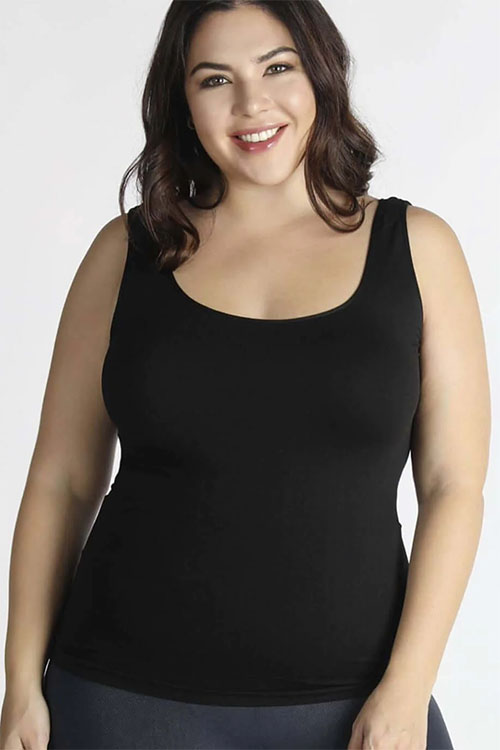 Plus-sized woman wearing black tank top.