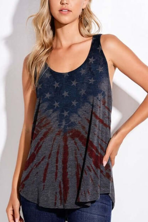 Young woman wearing tank top with American flag print in dark shades.