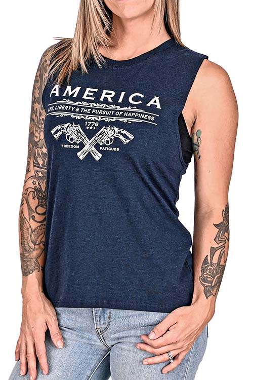 Blue muscle tank with crossed revolvers and the words 'America, life, liberty and the pursuit of happiness'.
