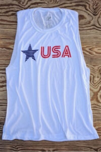 White athletic tank top with blue star and the word USA on the chest.