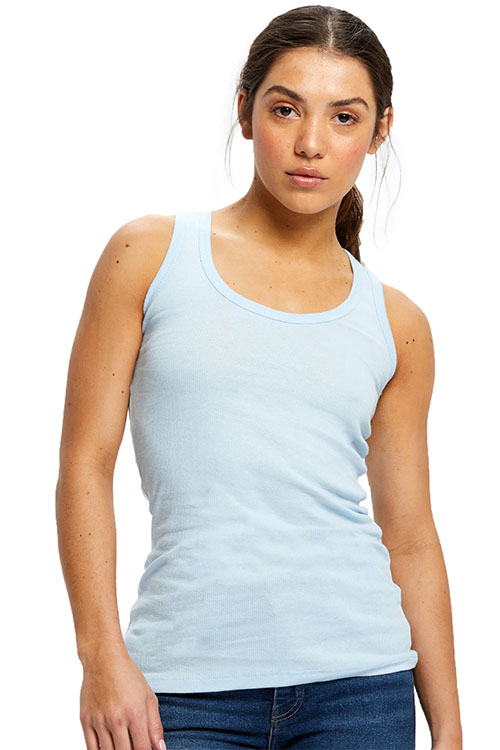 Woman wearing tight, light blue tank top.