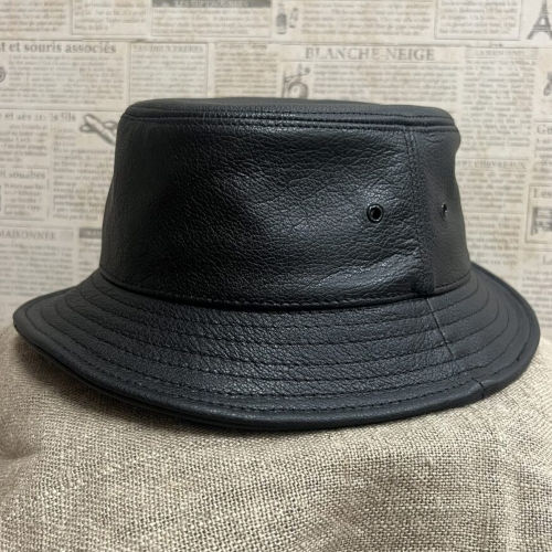 Black leather bucket hat.