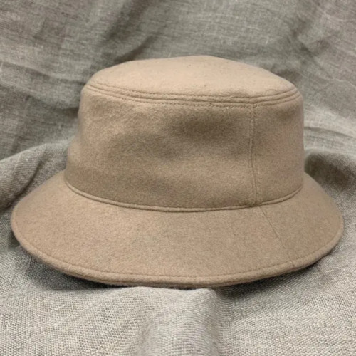 Beige wool bucket hat.